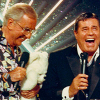 Jerry Lewis laughing with another white haired man