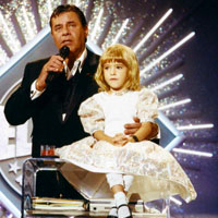 Jerry Lewis with a little girl on TV