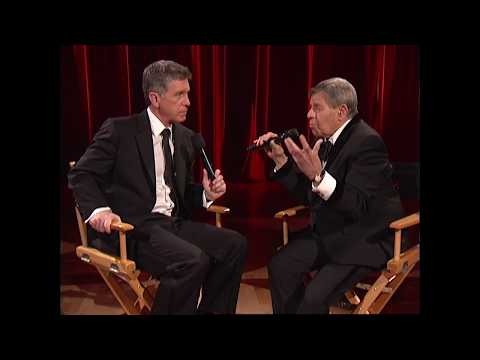 A picture of Jerry talking with Tom Bergeron