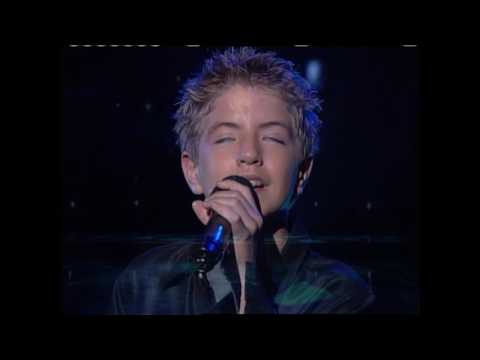 A picture of Billy Gilman singing
