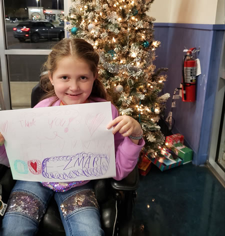 MDA National Ambassador Faith Fortenberry, kicks off the annual GPM Investments 'Tis The Season for Giving' holiday fundraising campaign to support the Muscular Dystrophy Association.