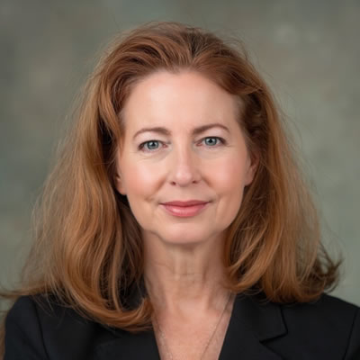 A headshot of Sharon Hesterlee.