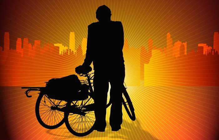 An orange graphic displaying a person with a tricycle