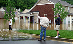 Flooded houses a few doors away from the author's home.