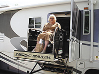 A Braun lift with its own door gives Barbara Graztke wheelchair access to her 40-foot motor home.