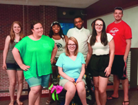 Lexi Buckalew (center) met new friends in her dorm and classes as well as through her work as an orientation leader for new students.