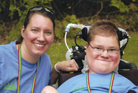 Nathan Mayer, with his home care provider, Amy Nystuen.