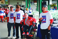 Teagan House and his high school football teammates raise funds for MDA Muscle Walk in 2015.