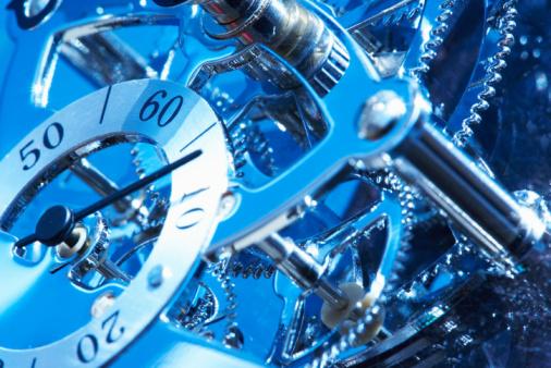 A picture of gears inside a clock