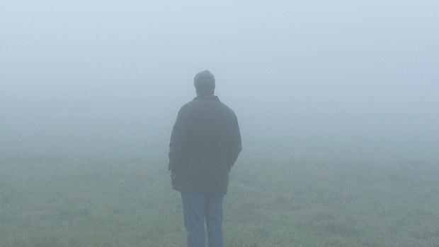 A man standing in the mist