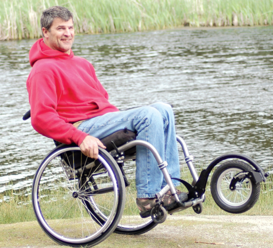 The FreeWheel is a single-wheel assembly that attaches to the front of a manual chair.