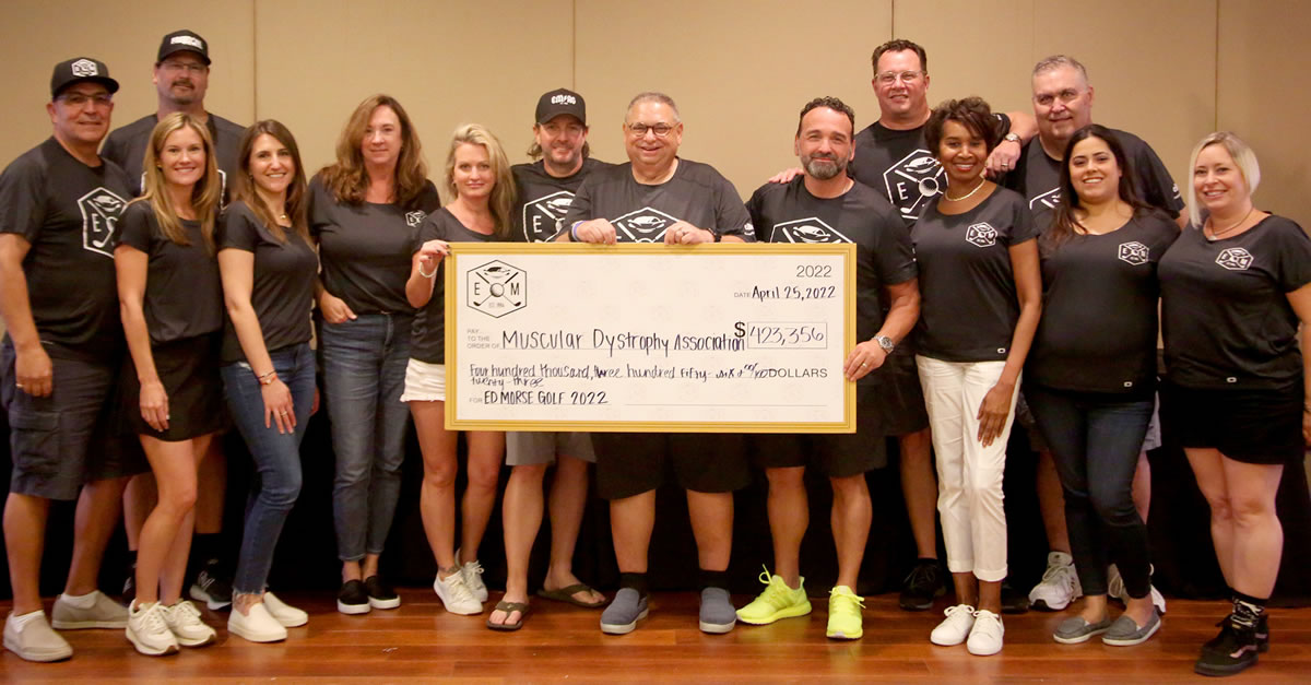 Teddy Morse, Chairman and CEO of the Ed Morse Automotive Group (center right) with the Ed Morse Automotive Team at the 28th Annual Ed Morse Golf Classic. Photo by Tim Stepien.