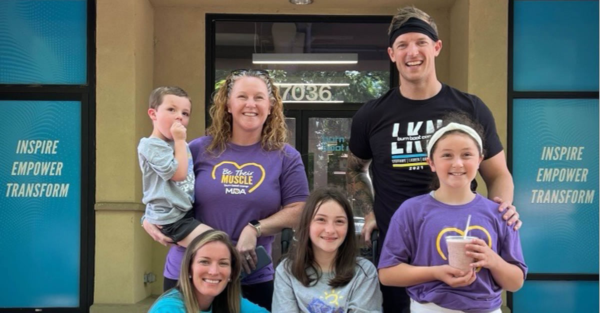 Mary with her son Matthew, daughter Brie who lives with muscular dystrophy, and daughter Gigi, flanked by Morgan and Devan Kline, founders of Burn Boot Camp -- national partners of the Muscular Dystrophy Association kicking off this year’s #BeTheirMuscle campaign.