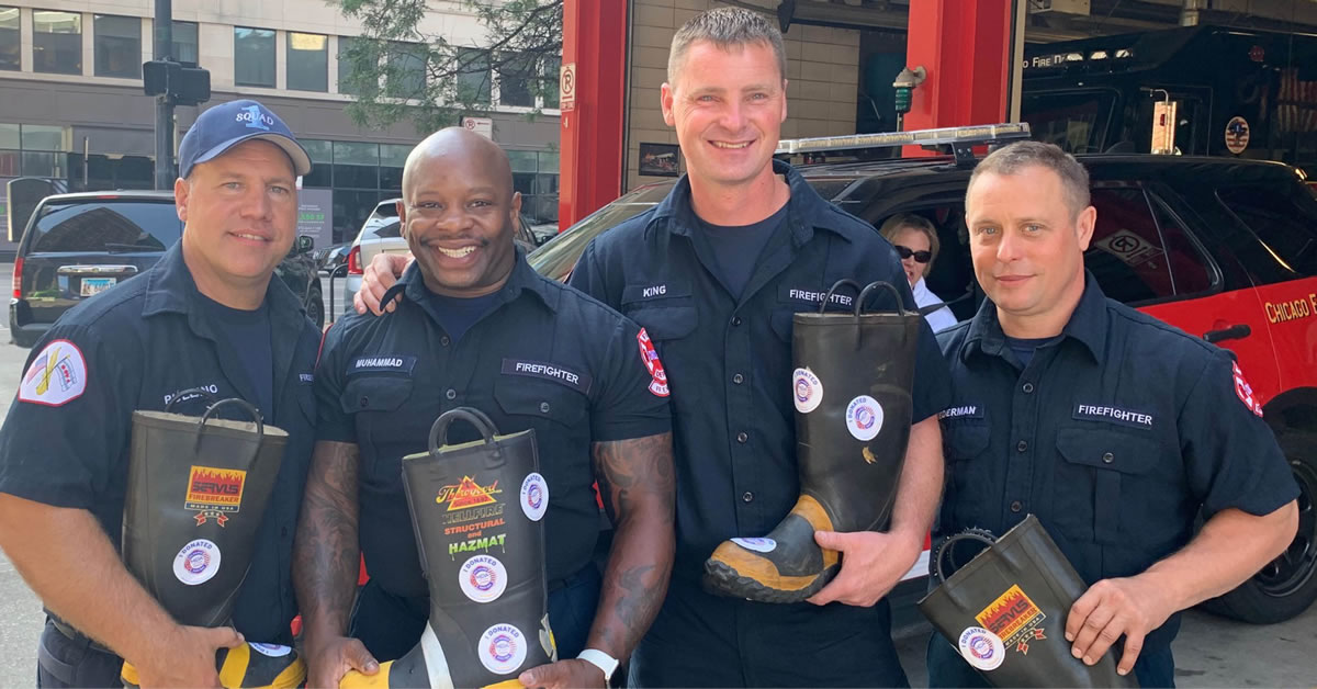 Image of firefighters holding FTB Boots