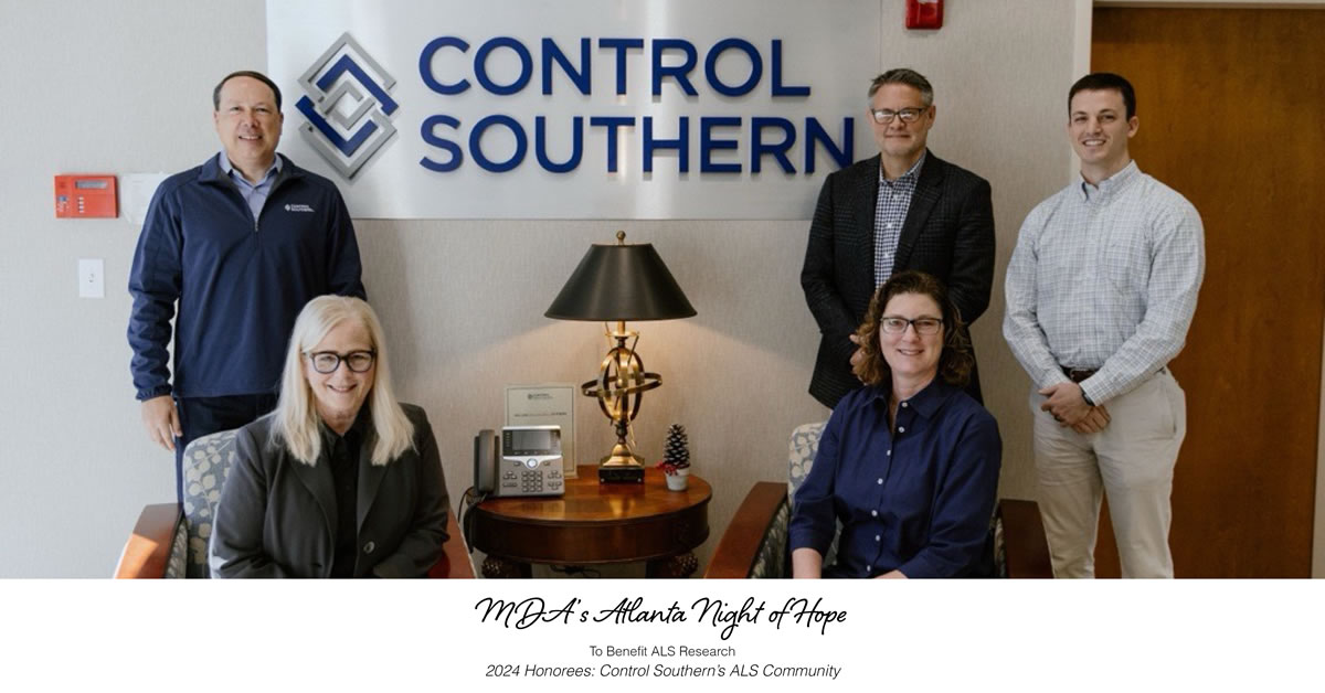 Image of 5 people standing and sitting in a Control Sothern office.