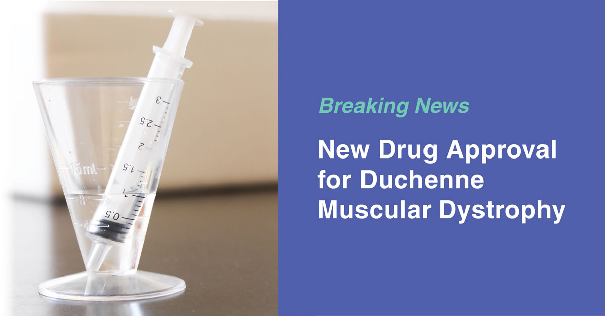 Image of a syringe in a glass with the text, Breaking News New Drug Approval for Duchenne Muscular Dystrophy