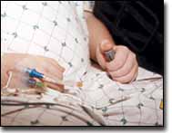 Jason controls his intravenous pain medication by pressing a button. Respiratory function has to be watched closely, however, because some pain medications affect it.