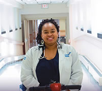 Vovanti Jones uses a mobility scooter in her work as a physician.